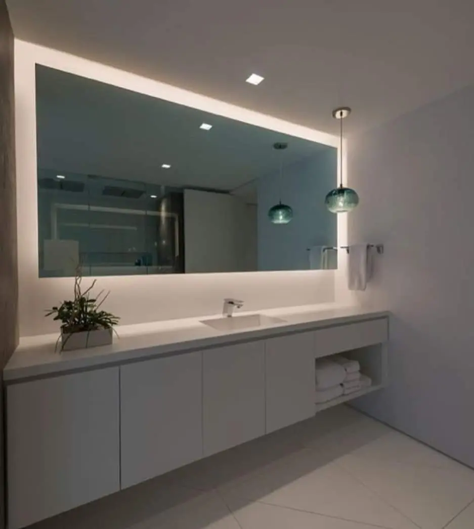 Modern bathroom vanity with illuminated mirror